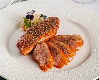 Duck breast on plate